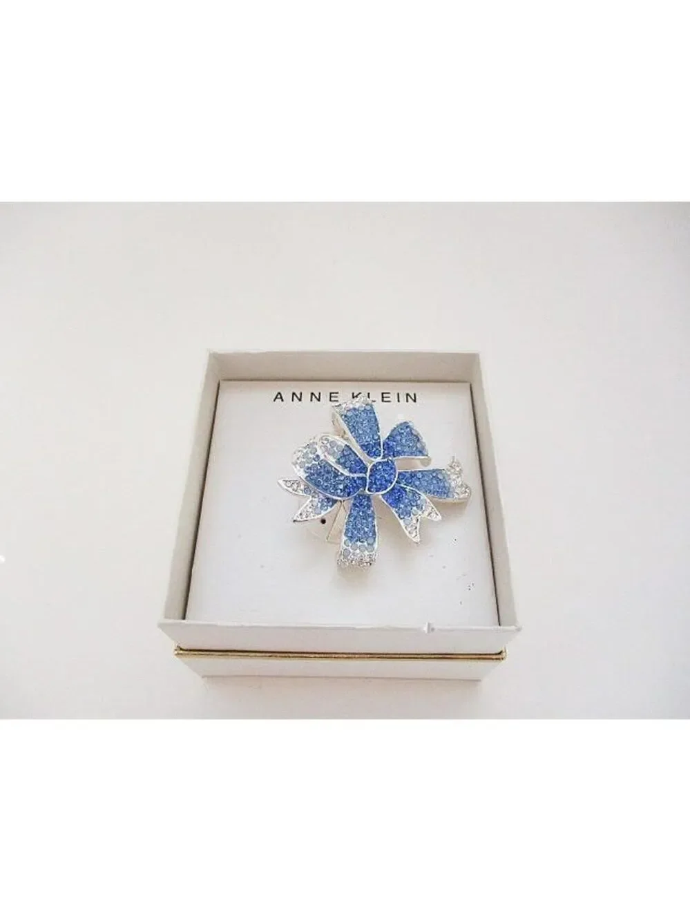 Anne Klein Silvertone, Blue, and Crystal Bow Broach